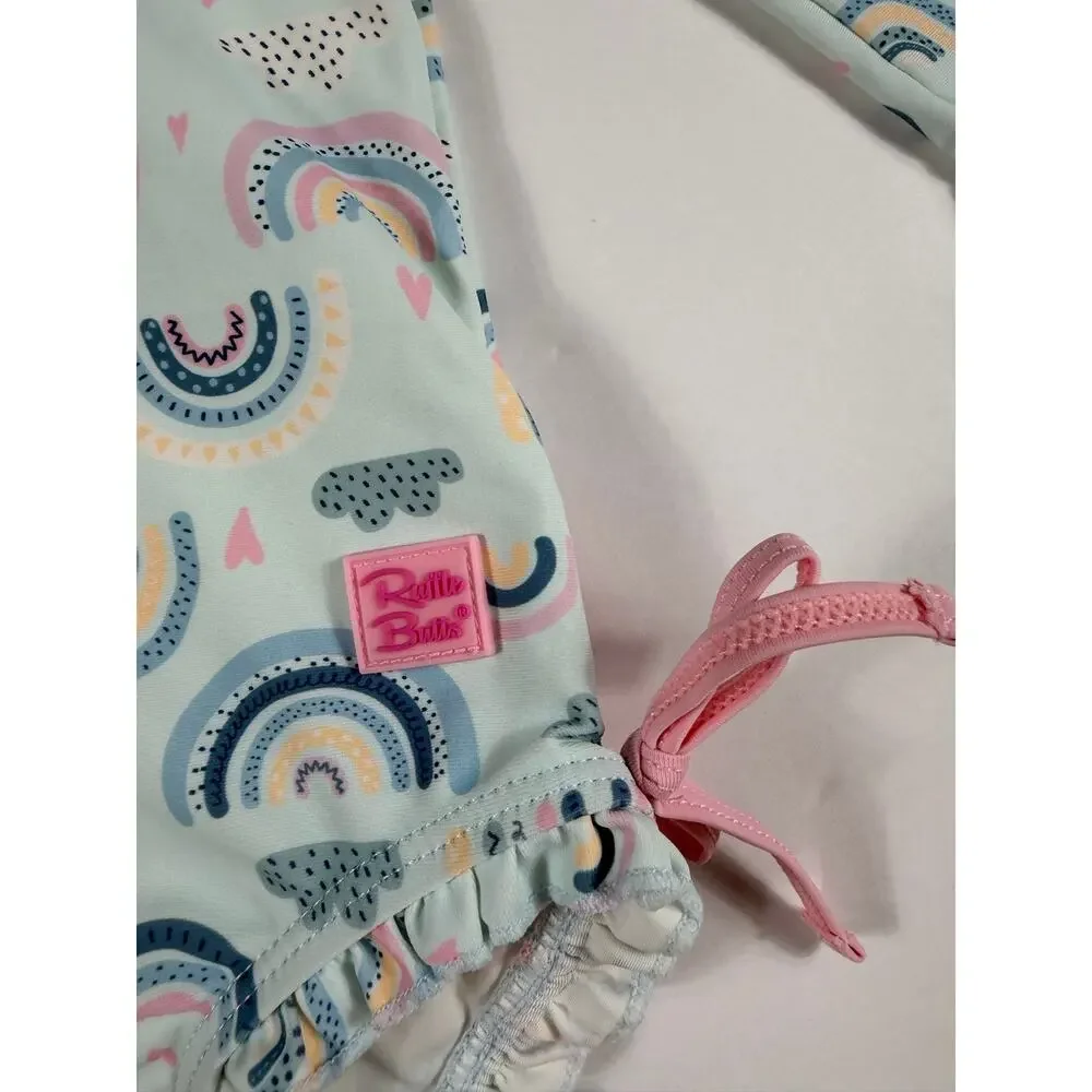 RuffleButts Rainbow Print Long Sleeve One-Piece Rash Guard Swimsuit 12–18 months